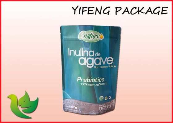 La serratura della chiusura lampo di plastica sta sull'imballaggio del sacchetto dell'alimento su misura sacchetti